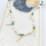 Κολιέ με φυσικά κοχύλια και ψαράκια ατσάλι