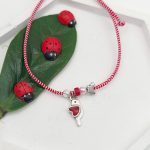 Μαρτάκι με κρεμαστό πουλάκι