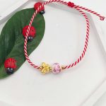 Μαρτάκι με πεταλούδα και φλοραλ χάντρα