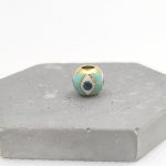 Charm χάντρα ατσάλι μάτι με βεραμάν σμάλτο